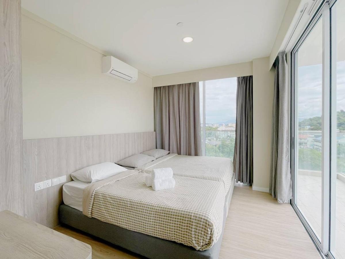 Queensland Suites At Aru Suites, Кота-Кинабалу Экстерьер фото