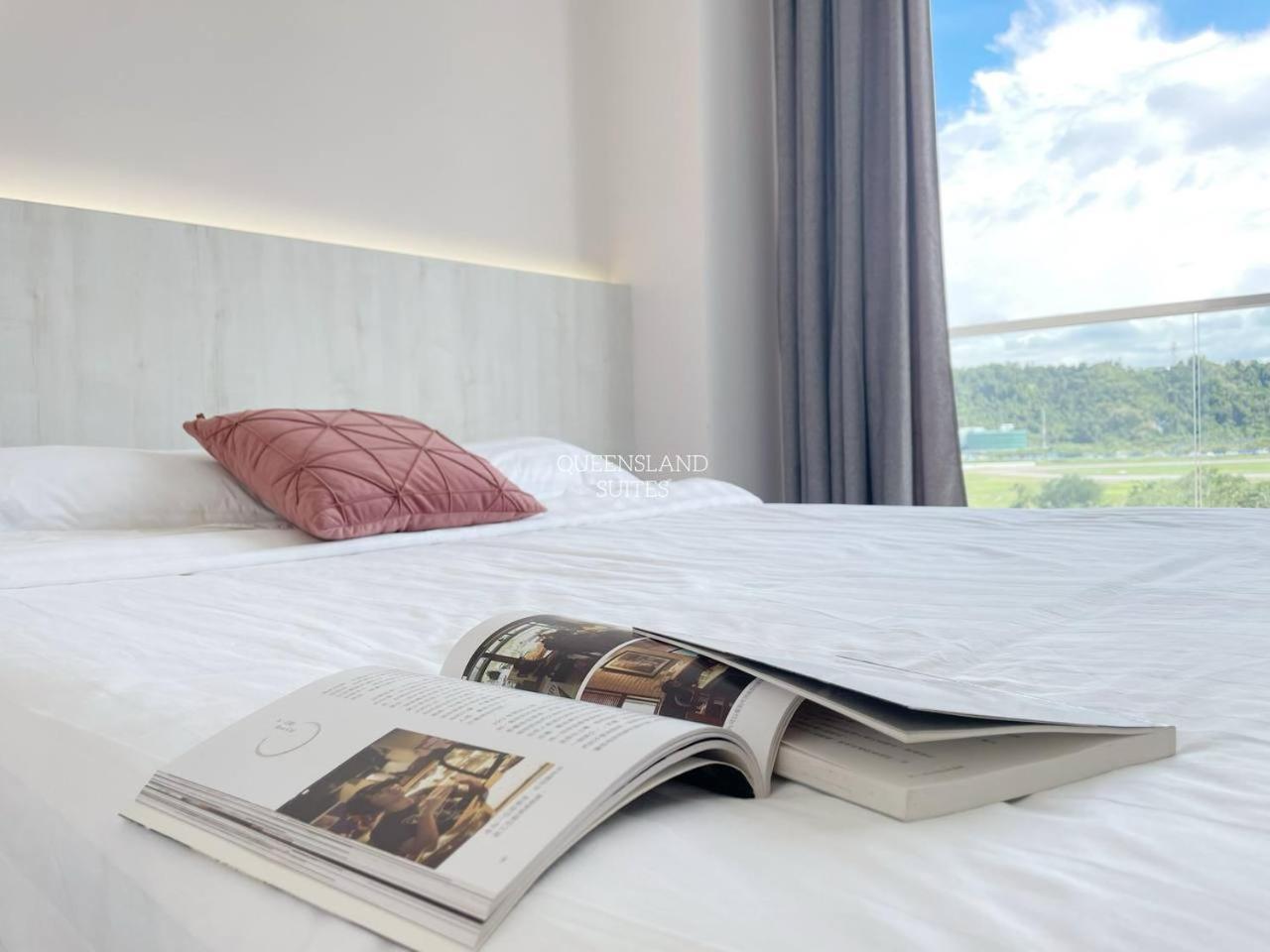Queensland Suites At Aru Suites, Кота-Кинабалу Экстерьер фото